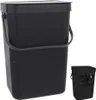 A black hanging trash can with a handle and lid, shown against a white background. A smaller inset image shows the back of a similar trash can with mounting hardware. Náhľad obrázku produktu