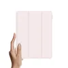 A hand holding a pink iPad case. Produktbild-Vorschau