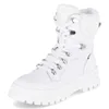 A white winter boot with laces and fur lining, shown from a three-quarter angle against a white background. Podgląd zdjęcia produktu