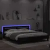 A bedroom scene at night with a bed featuring blue LED lighting. Náhled obrázku produktu