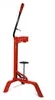A red and black manual bottle capper is shown against a white background. Anteprima dell’immagine prodotto