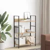 A bookshelf with items on it, placed in a room with a plant and curtains. Podgląd zdjęcia produktu
