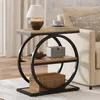 A side table with a lamp, books, and a small speaker next to a sofa. Anteprima dell’immagine prodotto