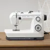 A white Husqvarna Onyx 25 sewing machine is shown on a wooden table. Produktbild-Vorschau