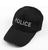 A black police cap with the word "POLICE" printed on it in gray letters, shown against a white background. Anteprima dell’immagine prodotto