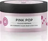 A pink jar of hair color refresh product with a black lid, set against a white background. Produktbild-Vorschau