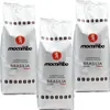 Three bags of Drago Mocambo coffee beans are displayed against a white background. Produktbild-Vorschau