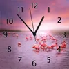 Wallario Design Wanduhr Rosa Flamingos bei Sonnenuntergang Produktbild-Vorschau 1