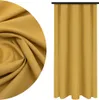 A close-up of fabric texture and a hanging curtain. Produktbild-Vorschau