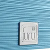 A close-up of a blue textured surface with a silver emblem. Voir les images du produit