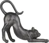 A black cat figurine stretching, shown from the side against a white background. Anteprima dell’immagine prodotto
