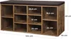 A shoe cabinet with a padded seat on top, showing dimensions. Náhľad obrázku produktu