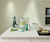 A collection of kitchen gadgets and food items arranged on a countertop. Anteprima dell’immagine prodotto
