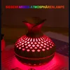 A decorative diffuser with colored lighting. Produktbild-Vorschau