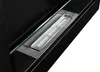 A close-up view of a black bio-fireplace burner with a glass element. Anteprima dell’immagine prodotto