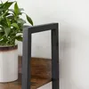 A close-up shot of a shelf unit with a plant in a pot. Podgląd zdjęcia produktu