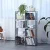 A multi-shelf bookcase filled with books and decorative items, placed in a room with sheer curtains in the background. Produktbild-Vorschau