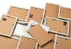 A pile of empty picture frames, some with backing boards and photos, arranged on a white background. Podgląd zdjęcia produktu