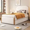 A child's bedroom with a bed, bookshelf, and artwork. Náhled obrázku produktu