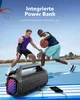 Two men playing basketball on an outdoor court, with a portable speaker in the foreground charging a phone. Produktbild-Vorschau