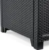 A close-up view of the bottom corner of a dark gray rattan-style garden chair, showing its textured surface and black legs. Produktbild-Vorschau