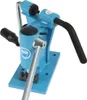 A blue metal tool with silver and black handles, mounted on a blue base. Produktbild-Vorschau