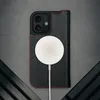 A black leather iPhone case with red stitching is shown, with a white MagSafe charger attached. Voir les images du produit