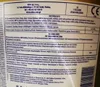 A close-up of a label on a product container, showing technical specifications and manufacturer information. Produktbild-Vorschau