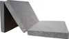 A gray folding mattress laid out on a white background. Náhled obrázku produktu