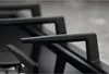 A close-up view of the black metal grates of a gas stove. Voir les images du produit