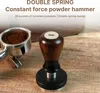 A coffee tamper and portafilter with coffee grounds on a wooden surface, with marketing text overlaid. Náhled obrázku produktu