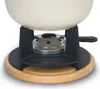 A close-up view of a fondue pot set, showing the base, burner, and the bottom of the pot. Voir les images du produit