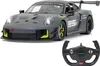 A remote-controlled Porsche 911 GT2 RS Clubsport 25 car and its steering wheel controller are displayed against a white background. Podgląd zdjęcia produktu
