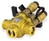 A brass plumbing valve with black plastic components, isolated on a white background. Náhľad obrázku produktu