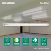 A fluorescent tube light is shown in the foreground, with a garage or workshop interior in the background. Below the light are several green icons with text indicating product specifications. Produktbild-Vorschau