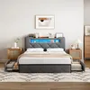 A bedroom scene featuring a modern bed with storage. Podgląd zdjęcia produktu