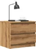 A wooden nightstand with two drawers, a black desk lamp, a book, and a cup of coffee on top. Anteprima dell’immagine prodotto