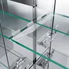 A close-up view of a modern cabinet with glass shelves and metal fixtures. Anteprima dell’immagine prodotto
