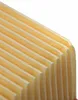 A close-up, angled view of folded yellow material, likely an air filter or similar component. Voir les images du produit