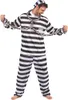 A man wearing a prisoner costume with chains. Produktbild-Vorschau
