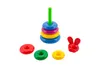 A stacking ring toy with a bunny head and loose rings on a white background. Podgląd zdjęcia produktu