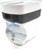 A white and gray Beurer sea air simulator with a circular sticker showing a beach scene and product information. Produktbild-Vorschau