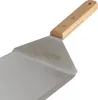 A close-up view of a metal spatula with a wooden handle. Náhled obrázku produktu