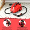 A red steam cleaner is shown on a patterned rug, with close-up insets highlighting its features. Náhľad obrázku produktu
