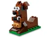 A LEGO brick-built dog on a green baseplate. Produktbild-Vorschau