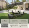 An outdoor patio set with a large cantilever umbrella, sofa, armchair, and coffee table on a green lawn. Produktbild-Vorschau