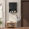 A hallway with a wall-mounted cabinet, a bench, and a door. Podgląd zdjęcia produktu