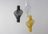Three pendant lamps in different colors hanging against a white wall. Produktbild-Vorschau