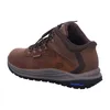 A brown Skechers waterproof boot is shown from the side against a white background. Voir les images du produit