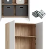 A collage showing a white and wood-tone cabinet with two shelves and two doors, along with two gray storage boxes on the top shelf of a similar cabinet, and a close-up of two metal cabinet feet. Voir les images du produit